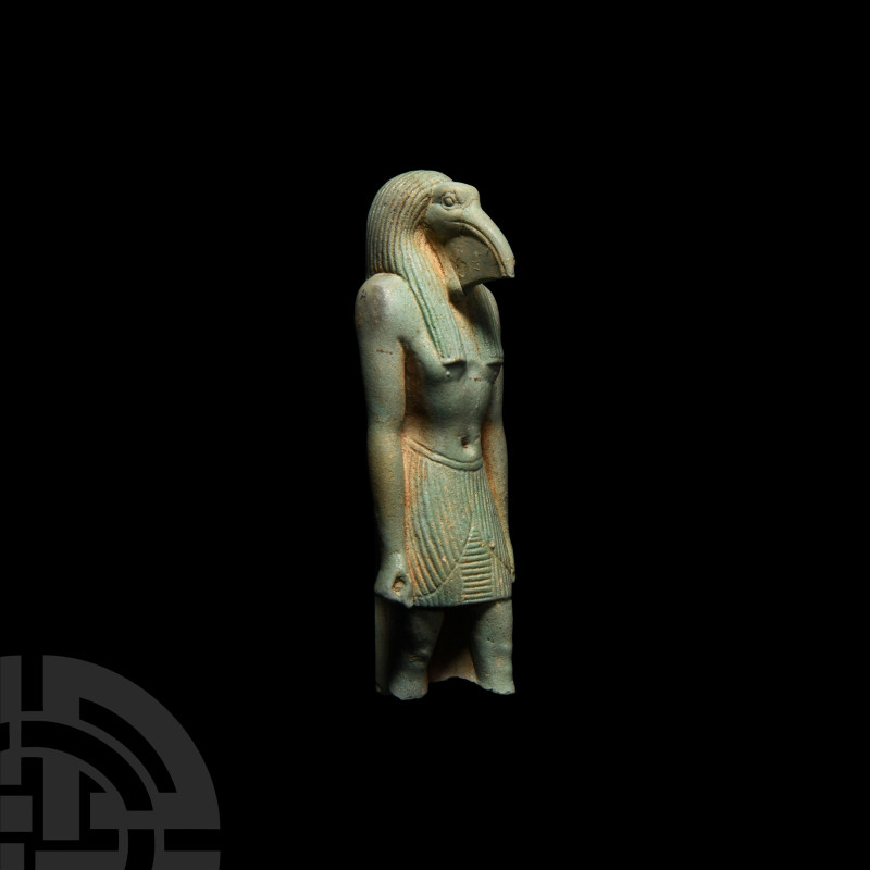 Egyptian Faience Figure of Thoth
26th Dynasty, 664-525 B.C. A pale green glazed...