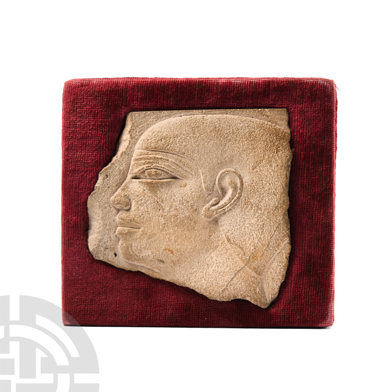 Egyptian Limestone Fragment with Face
Old Kingdom, 2686-2181 B.C. A carved lime...