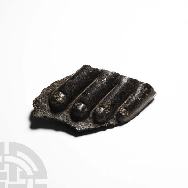 Egyptian Black Granite Foot Fragment
Late New Kingdom, 1550-1070 B.C. A carved ...