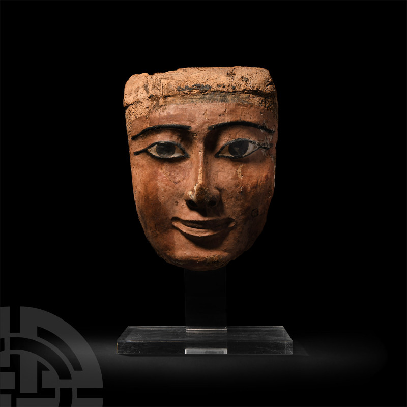 Egyptian Wooden Painted Mask
Late New Kingdom, 1350-1070 B.C. A wooden funerary...