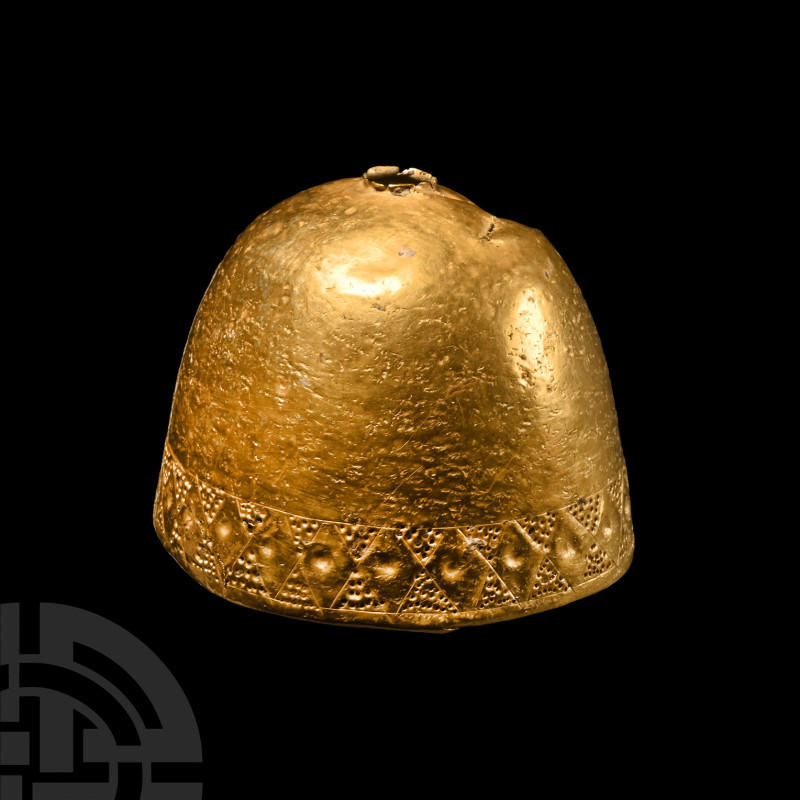 Scythian Decorated Gold Bell
1st millennium B.C. A sheet-gold bell, domed with ...