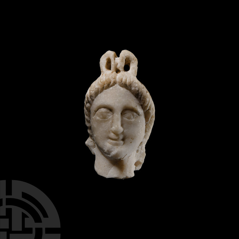 Graeco-Parthian Marble Head of a Divinity
2nd century B.C.-1st century A.D. An ...