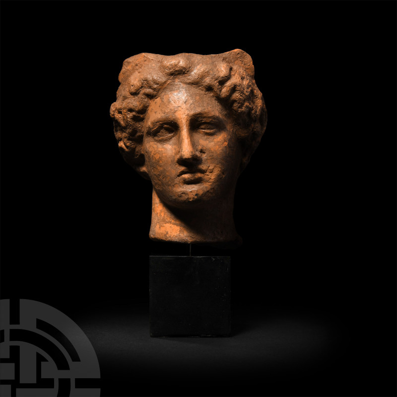 Greek Terracotta Head of a Woman
3rd-2nd century B.C. A terracotta bust of a wo...