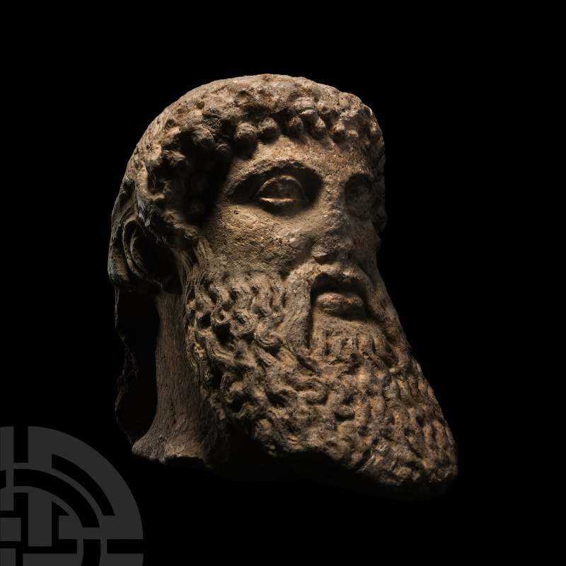 Greek Bearded Hermes Head
1st -2nd century A.D. A carved marble head of Hermes ...
