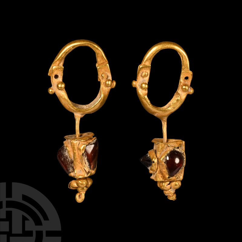 Roman Gold Earring Pair
1st-3rd century A.D. A matched pair of gold earrings, e...