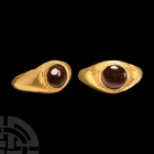 Roman Gold Ring with Garnet Cabochon