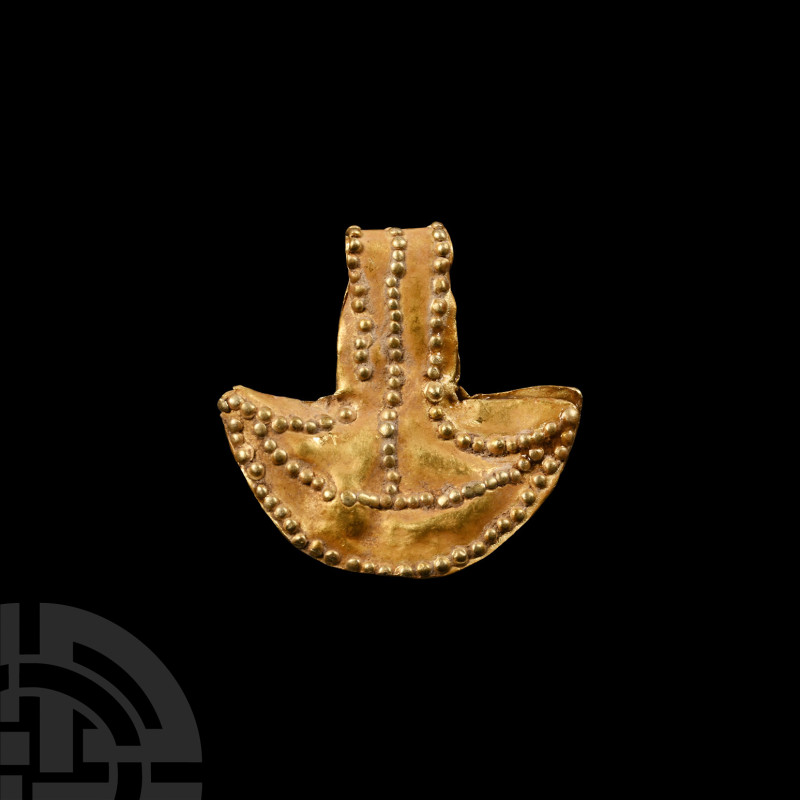 Viking Age Gold Hammer Amulet
9th-12th century A.D. A sheet-gold hammer amulet ...