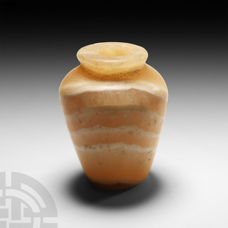 Egyptian Alabaster Vessel
Late Period, 664-332 B.C. A piriform veined alabaster...