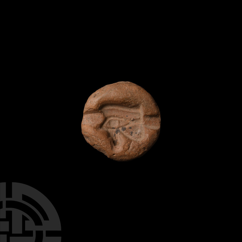 Egyptian Terracotta Eye of Horus Mould
New Kingdom, 1390-1069 B.C. A terracotta...