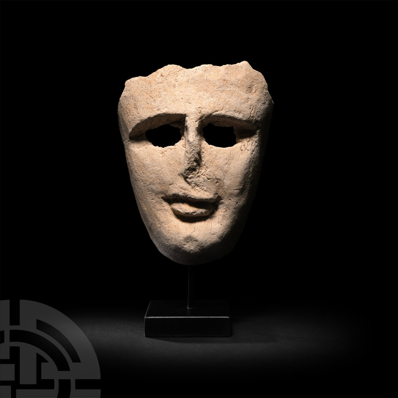 Phoenician Terracotta Mask
6th-4th century B.C. A cream-white ceramic mask with...