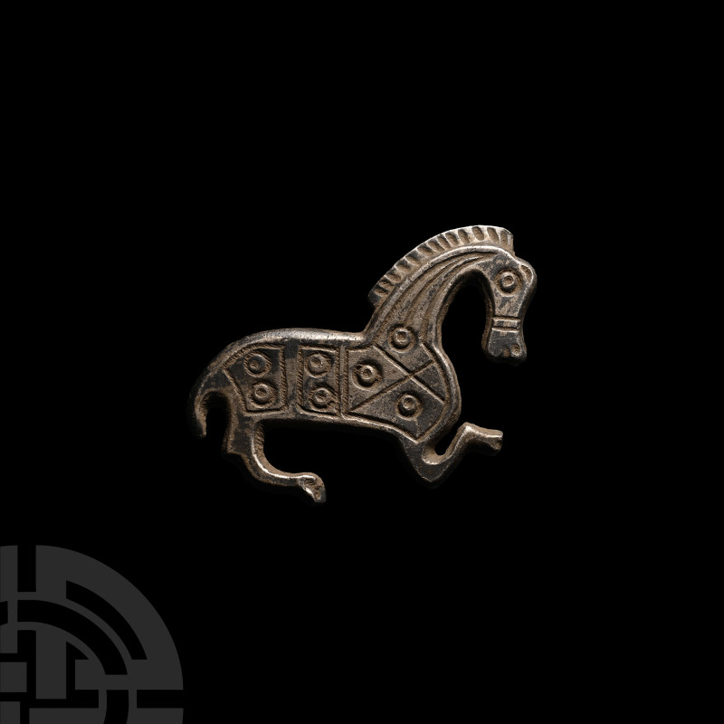 Roman Silver Horse Brooch
2nd-3rd century A.D. A silver plate brooch formed as ...