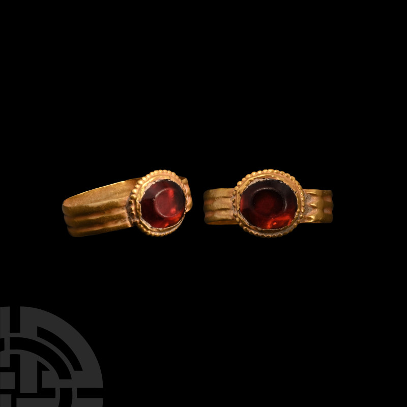 Roman Gold Ring with Garnet Gemstone
1st century B.C.-1st century A.D. A gold r...