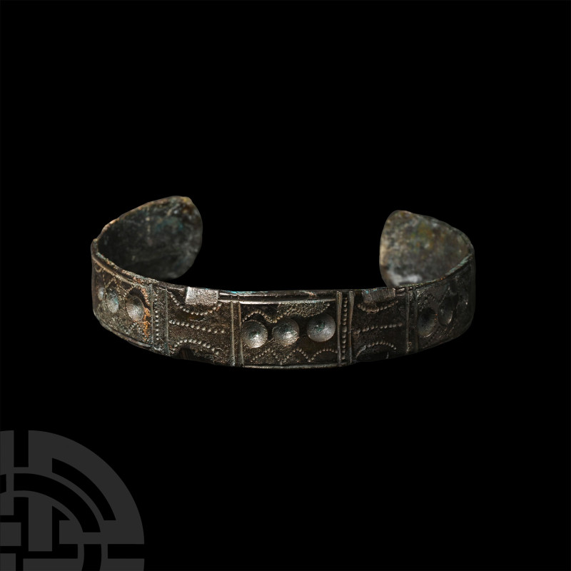 Roman Decorated Bracelet
Circa 1st-2nd century A.D. A copper-alloy bracelet for...