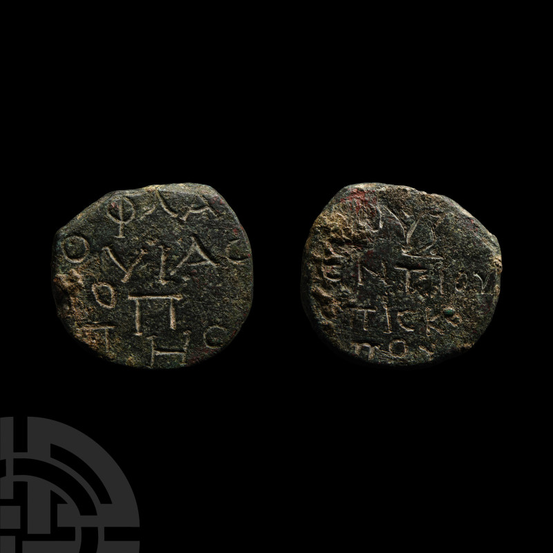 Late Roman Double-Sided Bulla with Inscription
4th-5th century A.D. A bronze di...