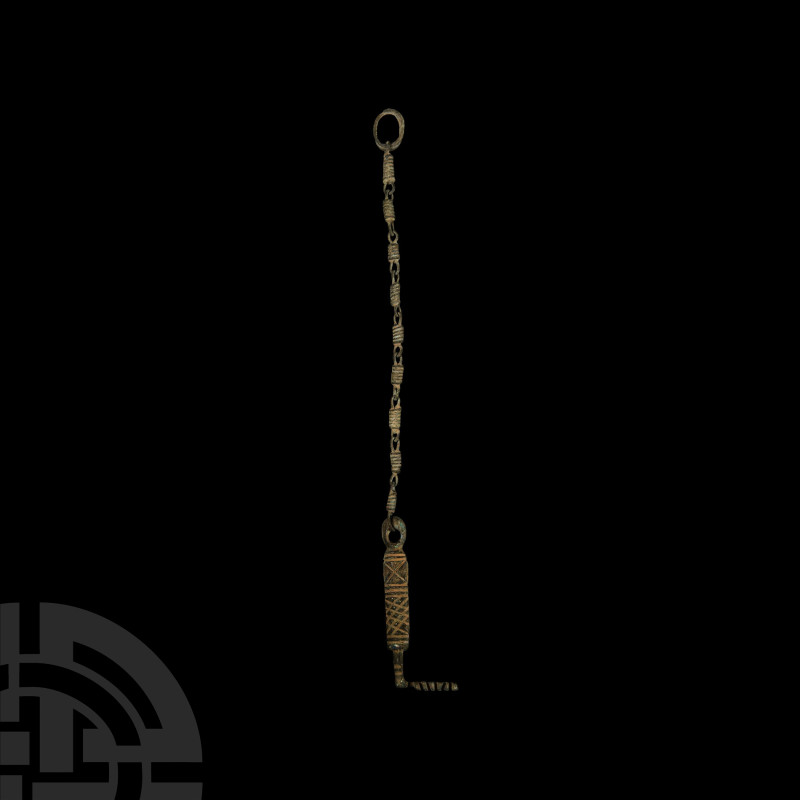 Roman Key with Chain
2nd-3rd century A.D. A key composed of a D-section handle ...