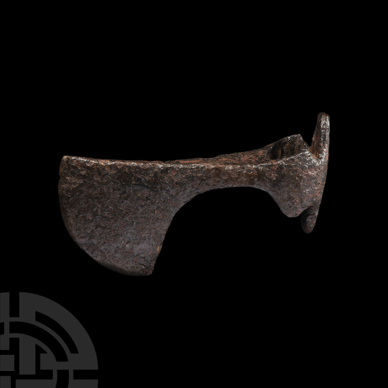 Viking Rus Period Bearded Type Axehead
Circa 11th century A.D. An iron axehead ...