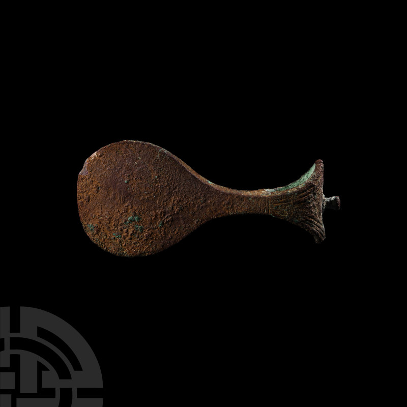 Western Asiatic Paddle-Shaped Axehead
3rd millennium B.C. A copper-alloy axehea...