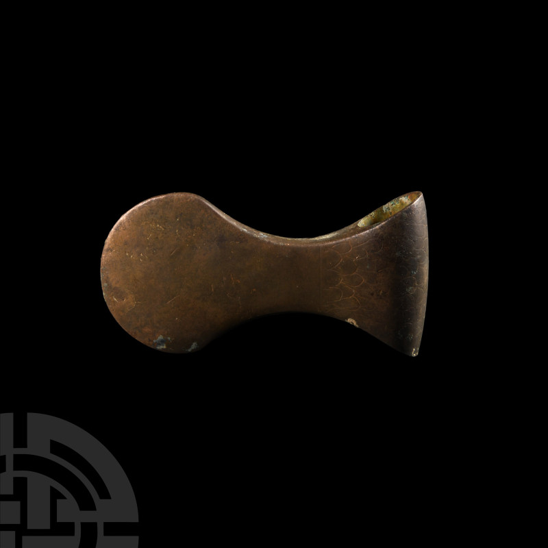 Western Asiatic Paddle-Shaped Axehead
2nd-1st millennium B.C. A copper-alloy ax...