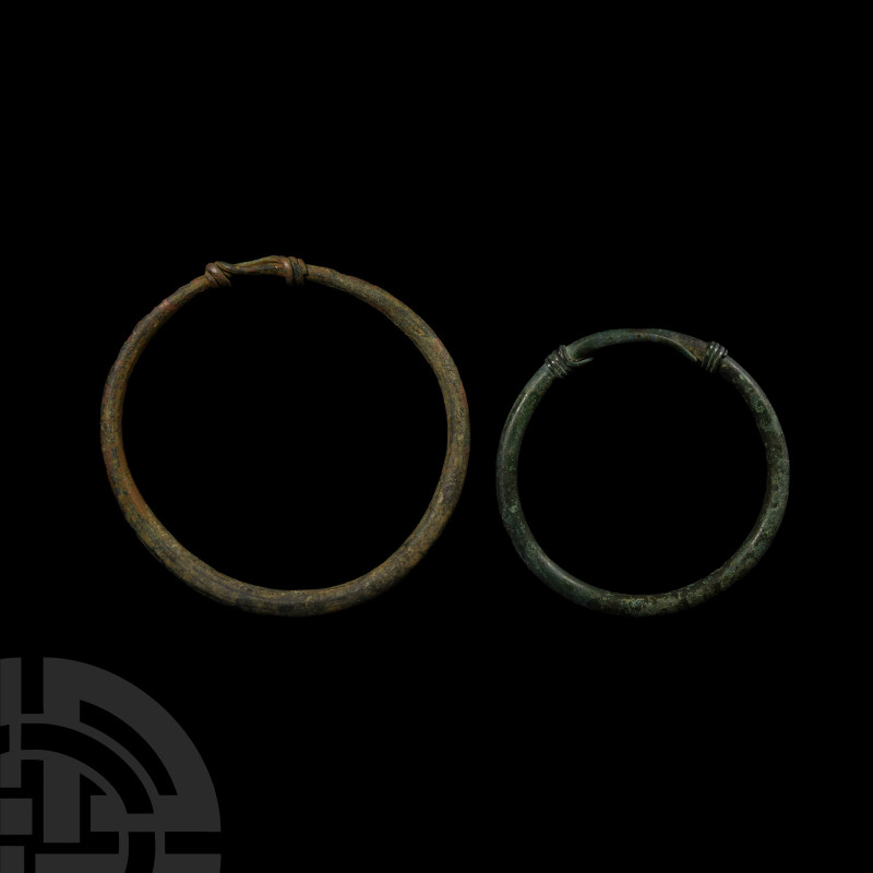 Bronze Age Large Bracelet Pair
2nd-1st millennium B.C. A pair of bronze bangles...