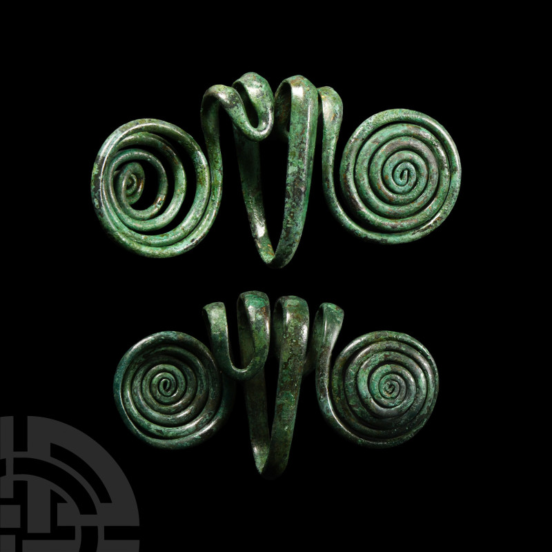 Bronze Age Temple Ring Pair
2nd millennium B.C. A matching pair of temple headd...