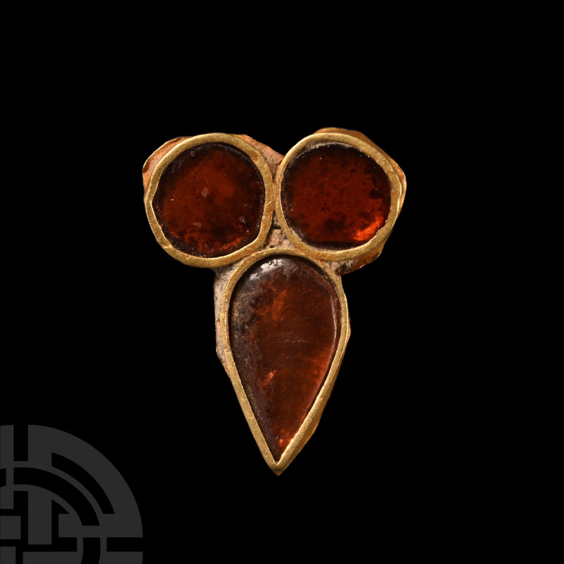 Migration Period Gold Teardrop Jewel with Garnets
5th-6th century A.D. A gold t...