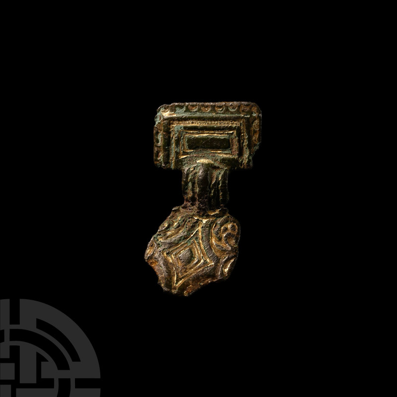 Anglo-Saxon Gilt Small Square-Headed Brooch
Circa 6th century A.D. A gilt-bronz...