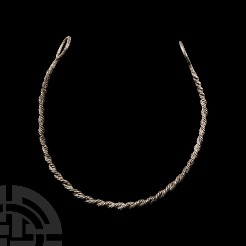 Viking Age Silver Twisted Torc
9th-11th century A.D. A small silver neck torc f...