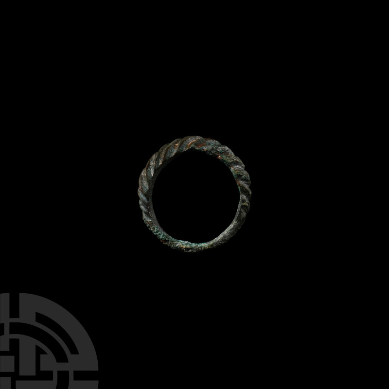 Viking Period Faux Twist Ring
Circa 10th century A.D. A copper-alloy ring compo...