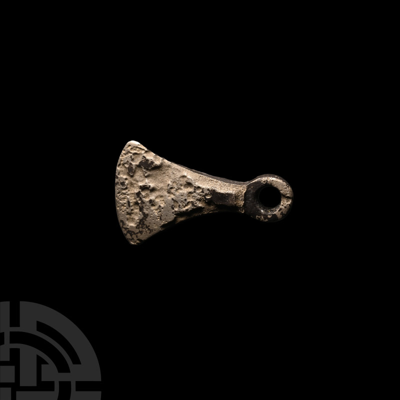 Viking Age Silver Axe Pendant
9th-11th century A.D. A silver miniature axehead ...