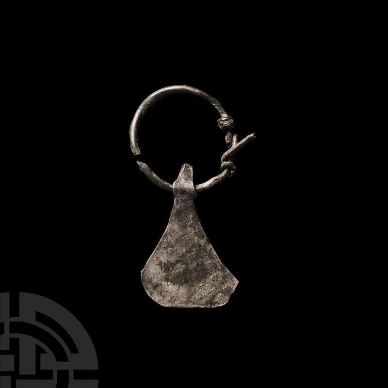 Viking Age Silver Axe Pendant
9th-11th century A.D. A silver pendant comprising...