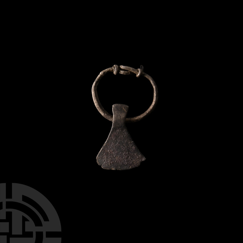 Viking Age Silver Axe Pendant
Circa 9th-11th century A.D. A silver axehead pend...