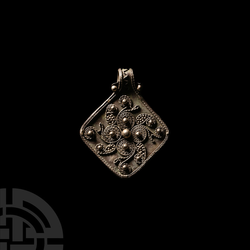 Viking Age Lozenge-Shaped Silver Filigree Pendant
9th-12th century A.D. A silve...