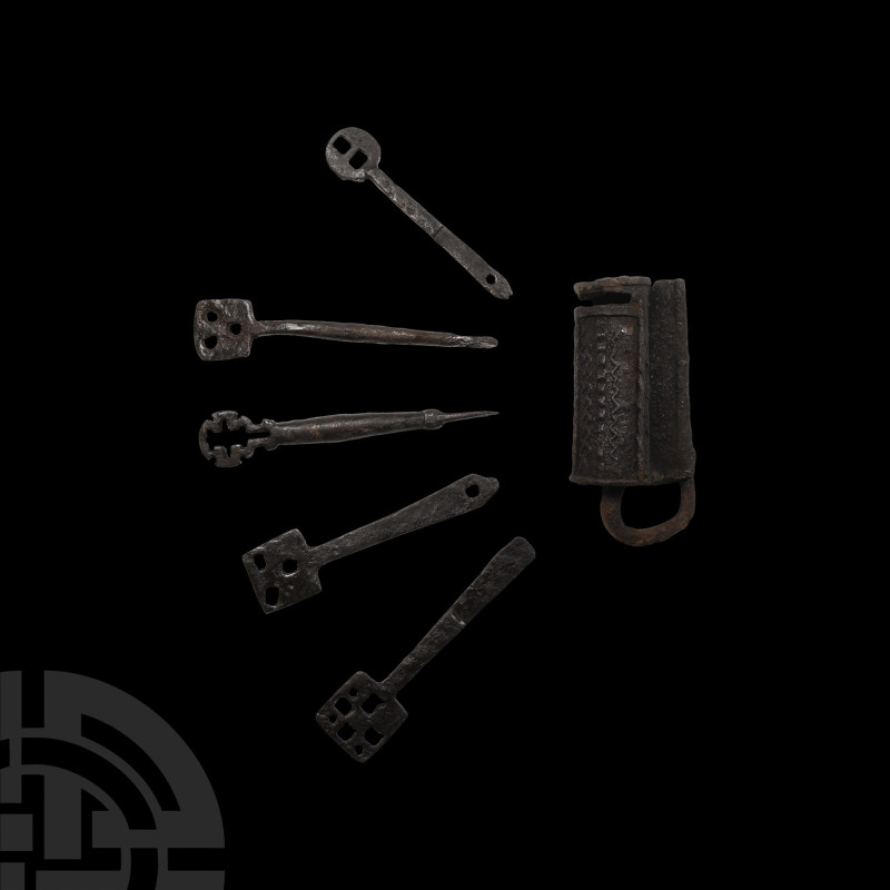 Viking Period Lock and Key Group
Circa 10th-12th century A.D. A group of iron k...