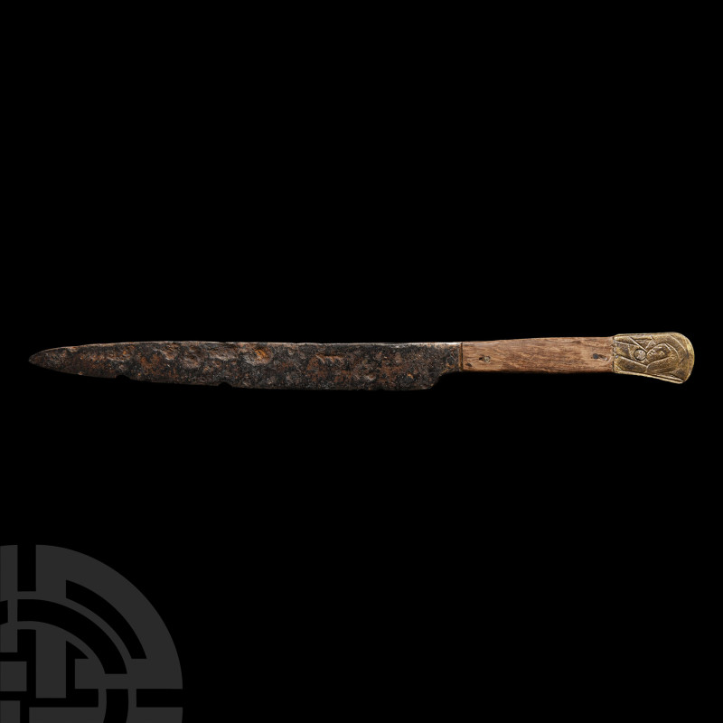 Medieval Knife with Bronze Pommel and Veiled Figure
Circa 1500 A.D. A scale tan...