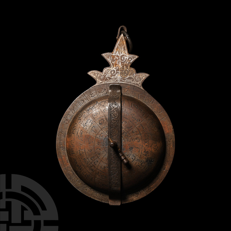 Silver Inlaid Astrolabe
20th century A.D. A base metal astrolabe, discoid with ...