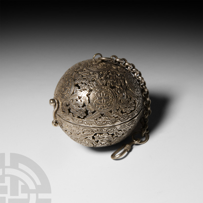 Post Medieval Gimballed Incense Burner
20th century A.D. A silver hinged spheri...