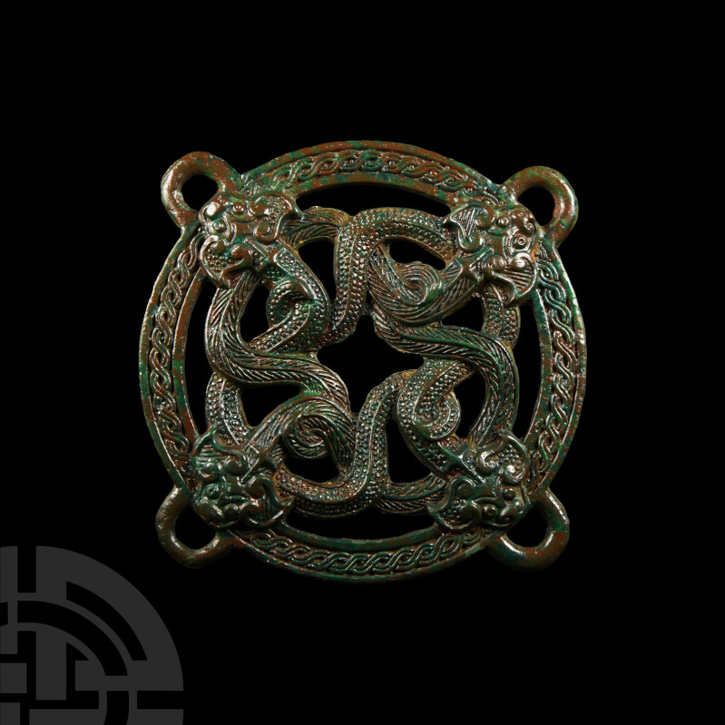 Chinese Ordos Style Dragon Belt Distributor
19th century A.D. A copper-alloy be...