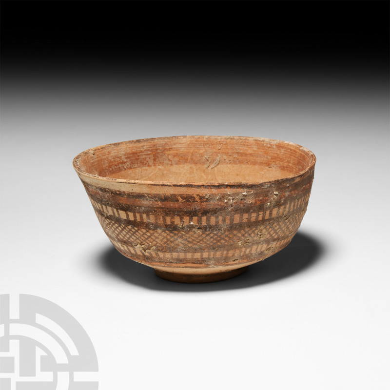 Mehrgarh Bichrome Cup
3rd millennium B.C. A squat ceramic cup with painted frie...