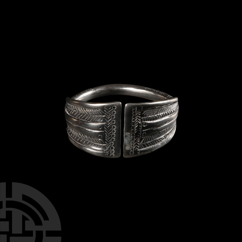 Silver Decorated Bracelet
Circa 19th century A.D. A silver penannular bracelet ...