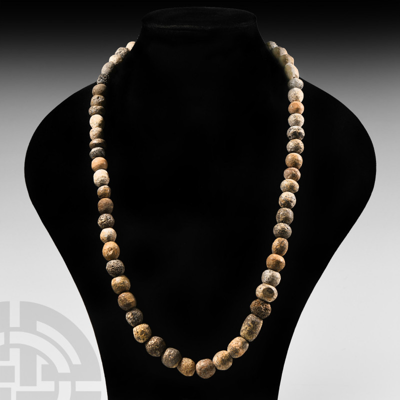 Natural History - Woolly Mammoth Bead Necklace
Devensian Period, 110,000-12,000...