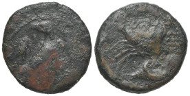 Sicily, Akragas, c. 415-406 BC. Æ Onkia (17mm, 3.61g, 11h). Eagle standing r. with head reverted, on a fish; cicada to l. R/ Crab; conch below; pellet...