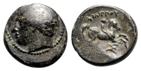 Kings of Macedon, Philip II (359-336 BC). Æ (19mm, 6.01g, 6h). Uncertain Macedonian mint. Diademed head of Apollo l. R/ Horseman r.; monogram below. C...