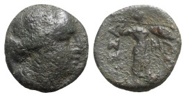 Thessaly, Thessalian League, c. 196-27 BC. Æ (18mm, 7.43g, 12h). Laureate head of Apollo r. R/ Athena Itonia advancing r.; monogram before. BCD Thessa...