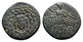 Pontos, Amisos, time of Mithradates VI, c. 85-65 BC. Æ (20mm, 6.42g, 12h). Aegis with Gorgoneion in centre. R/ Nike advancing r. holding wreath and pa...