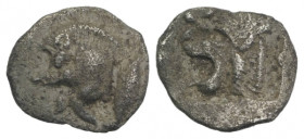 Mysia, Kyzikos, c. 450-400 BC. AR Hemiobol (6mm, 0.34g, 1h). Forepart of boar r.; tunny to l. R/ Head of roaring lion l., retrograde K to l.; all with...