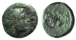 Mysia, Plakia(?), c. 4th century BC. Æ (11mm, 1.74g, 9h). Female head r. R/ Bull standing r. Cf. SNG Copenhagen 543. Green patina, encrustation, Good ...