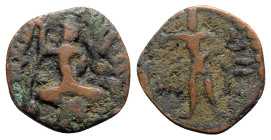 India, Kushan Empire. Huvishka (c. AD 151-190). Æ Tetradrachm (22mm, 5.96g, 2h). Huvishka seated facing cross-legged, holding ankuśa (elephant goad) a...