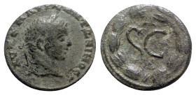 Elagabalus (218-222). Seleucis and Pieria, Antioch. Æ (18mm, 2.67g, 6h). Laureate head r. R/ Large SC, Δ above, Є below; all within laurel wreath. McA...