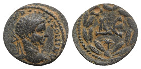 Elagabalus (218-222). Seleucis and Pieria, Antioch. Æ (20mm, 6.45g, 12h). Laureate bust r., with drapery on far shoulder. R/ Large ΔЄ, star below; all...