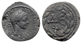 Elagabalus (218-222). Seleucis and Pieria, Antioch. Æ (23mm, 7.57g, 6h). Laureate bust r., with drapery on far shoulder. R/ Large ΔЄ, star below; all ...